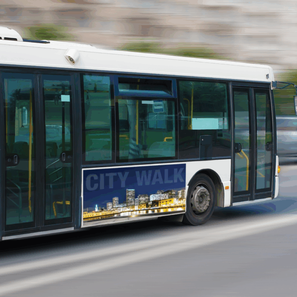 A photo of a city buss driving on the street. The background is blurred to denote movement. There is an advertisement on the side of the bus that consists of a city skyline at night and the text, "City Walk," in all caps. The advertisement is printed on GF 209.
