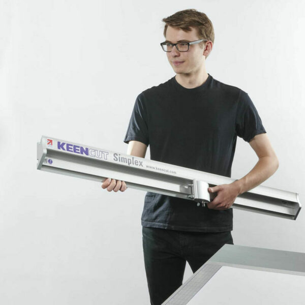 Technician holding KeenCut Simplex Cutter
