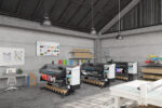 An image of HP Latex 730 and 830 printers in a print shop, showcasing their size in contrast to their surroundings.