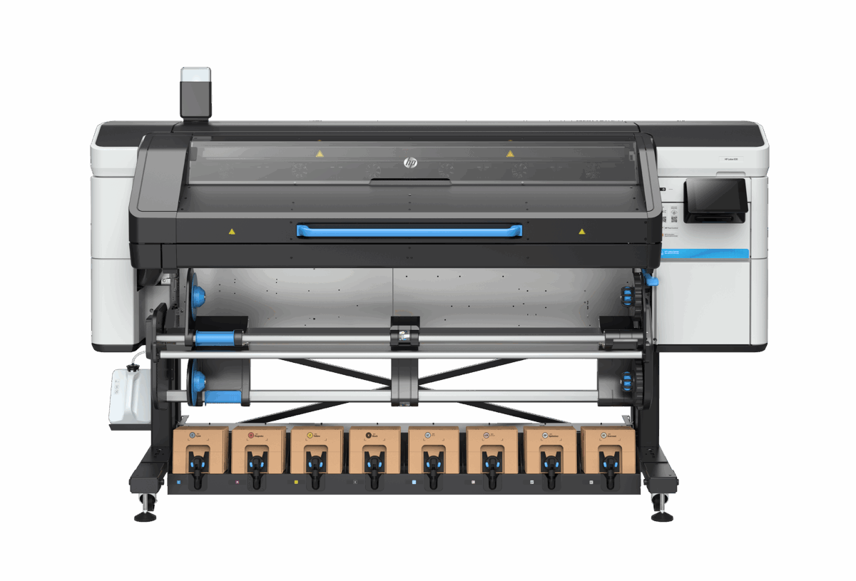 A photo of the HP Latex 830 from the front showcasing the ink loaded on the bottom, no paper loaded.