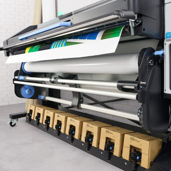 A photo of HP Latex 830W with printed paper coming out of of.