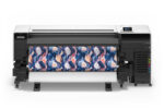 Photo of an Epson SureColor F9570 printer with a roll of media having a seamless pattern printed on it.