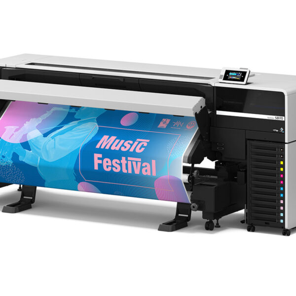 A photo of right angle view of the Epson SureColor S8170 64″ Printer with a blue and pink print coming out with the words "music festival."
