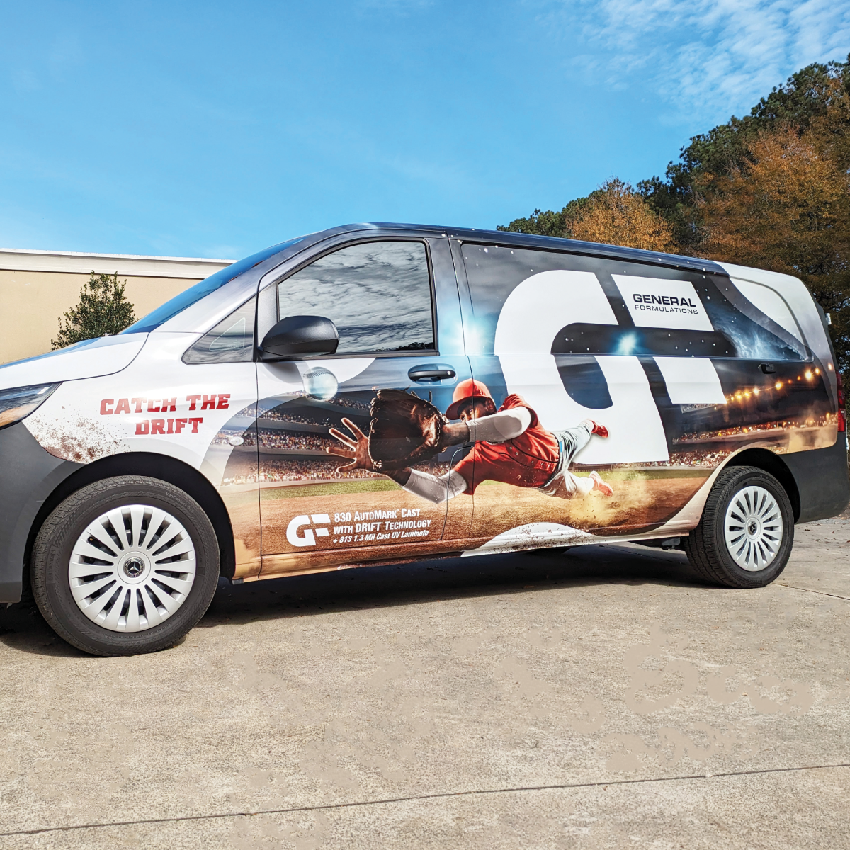 813_AutoMark-Cast_Image_square A photo of a General Formulations van with an image of a baseball player wearing red diving to catch the ball in the infield of a baseball stadium. Above is the GF logo large and in white. This was printed on GF 813.