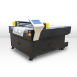 A photo of an STS C3135 Flatbed Cutter Machine at an angle that includes the front and side.